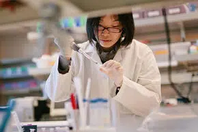 Female Researcher In Lab