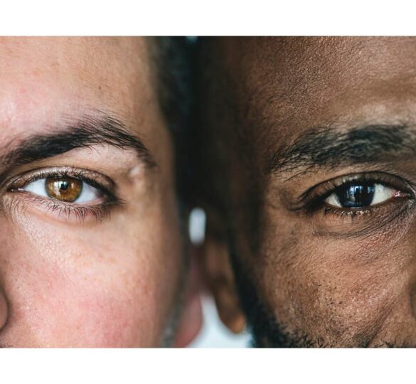 close-up photo of the eyes of two men