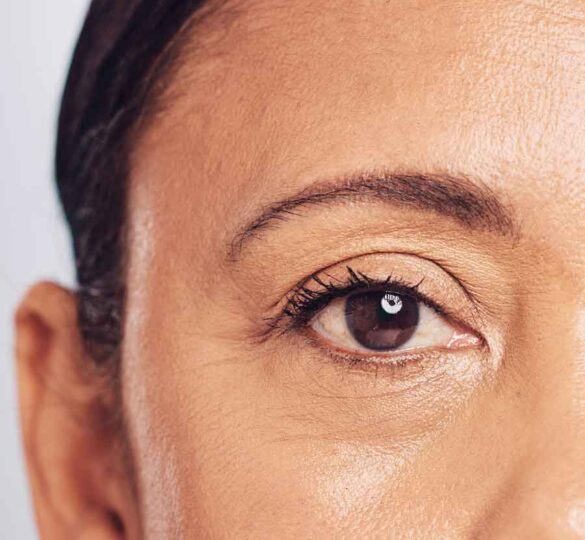 Close-up photo of a woman with brown eyes