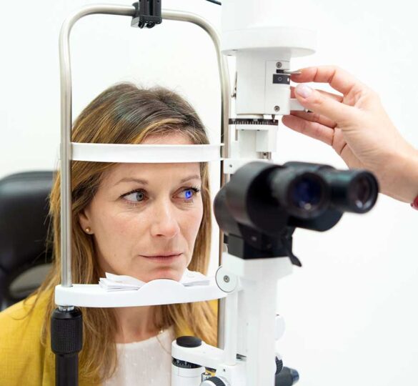 Woman getting an eye exam at doctor's office