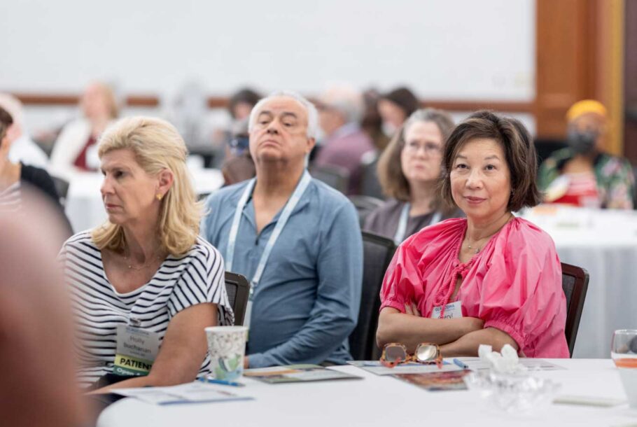 Attendees Facing The Stage