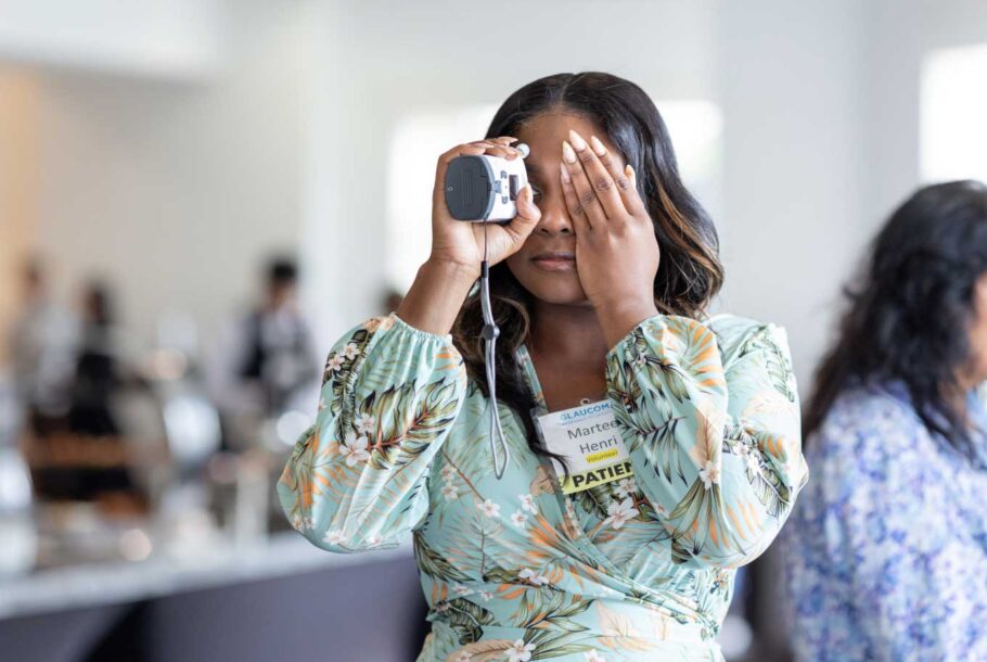 Woman Looking Through A Tonometer